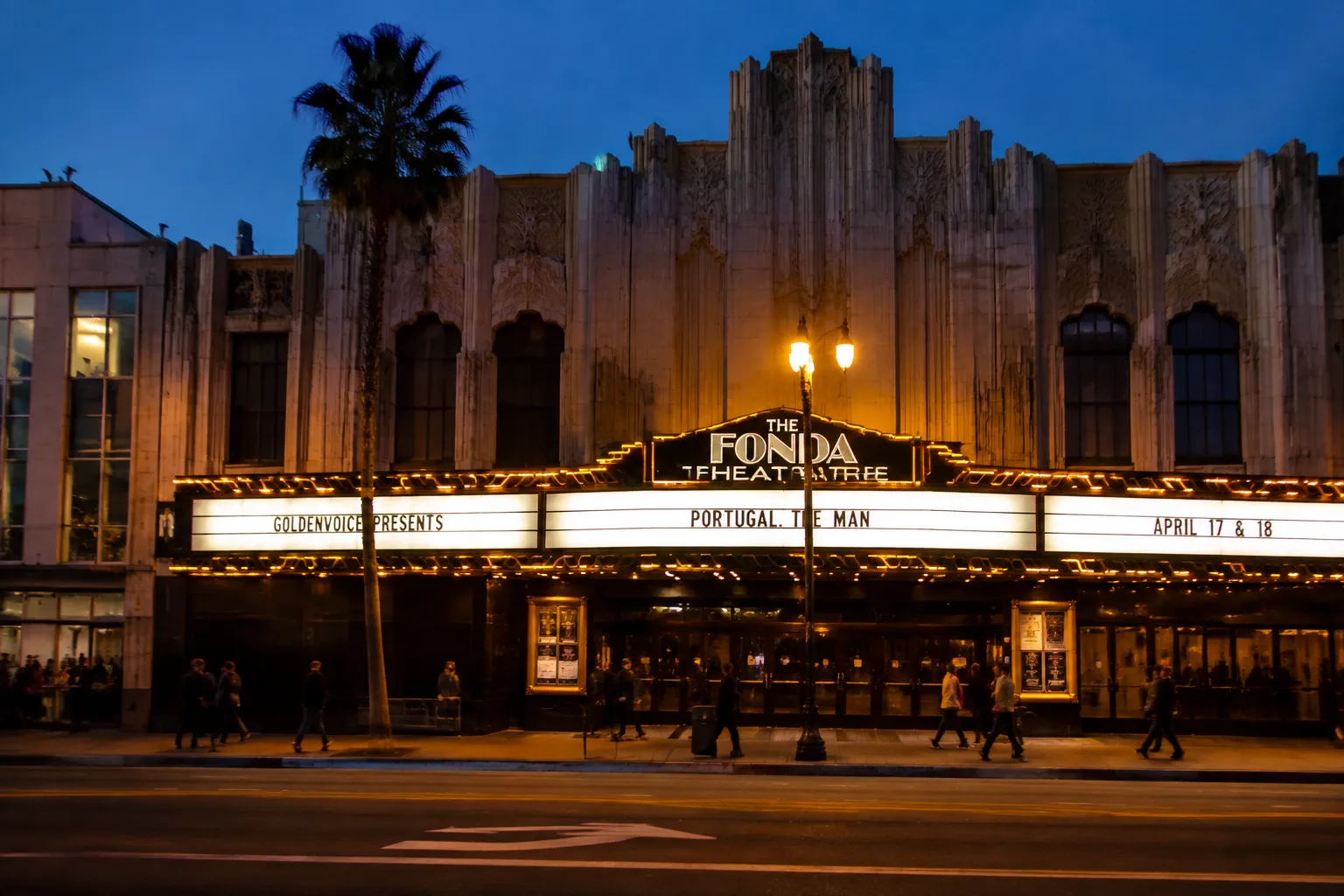 Fonda Theatre lit marquee on Hollywood Boulevard at dusk