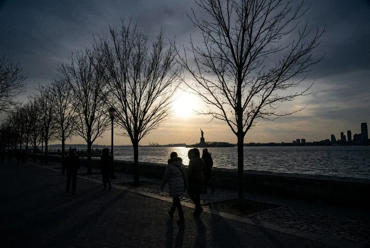 The Battery's Waterfront Promenade on a Clear Winter Morning