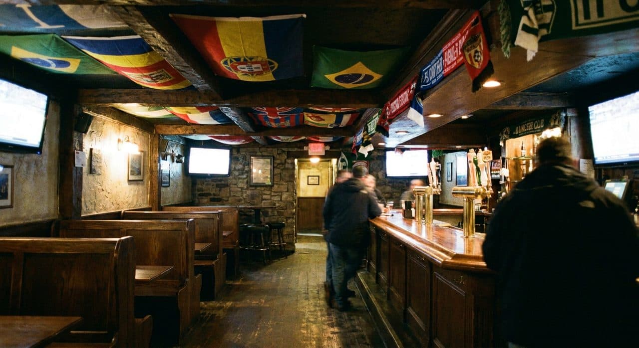 The Dual-Flag Sports Bar Where the Jukebox Plays Both Anthems on Repeat - cover image