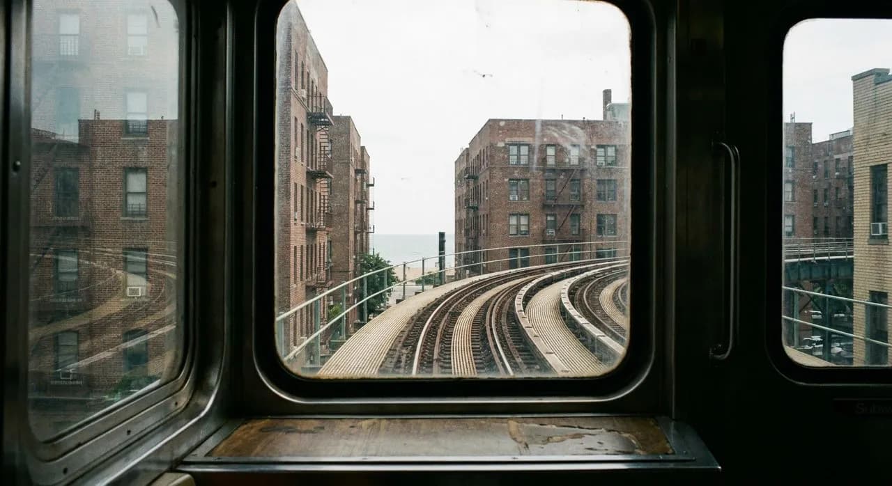 the Q train's elevated curve into brighton beach when the ocean appears