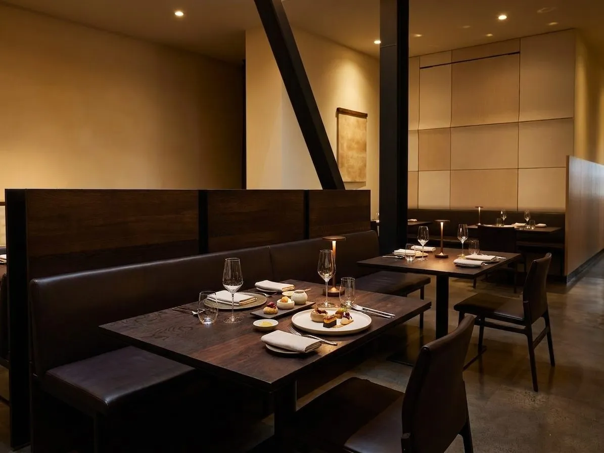 Dusk exterior of a San Francisco fine-dining restaurant with glowing windows