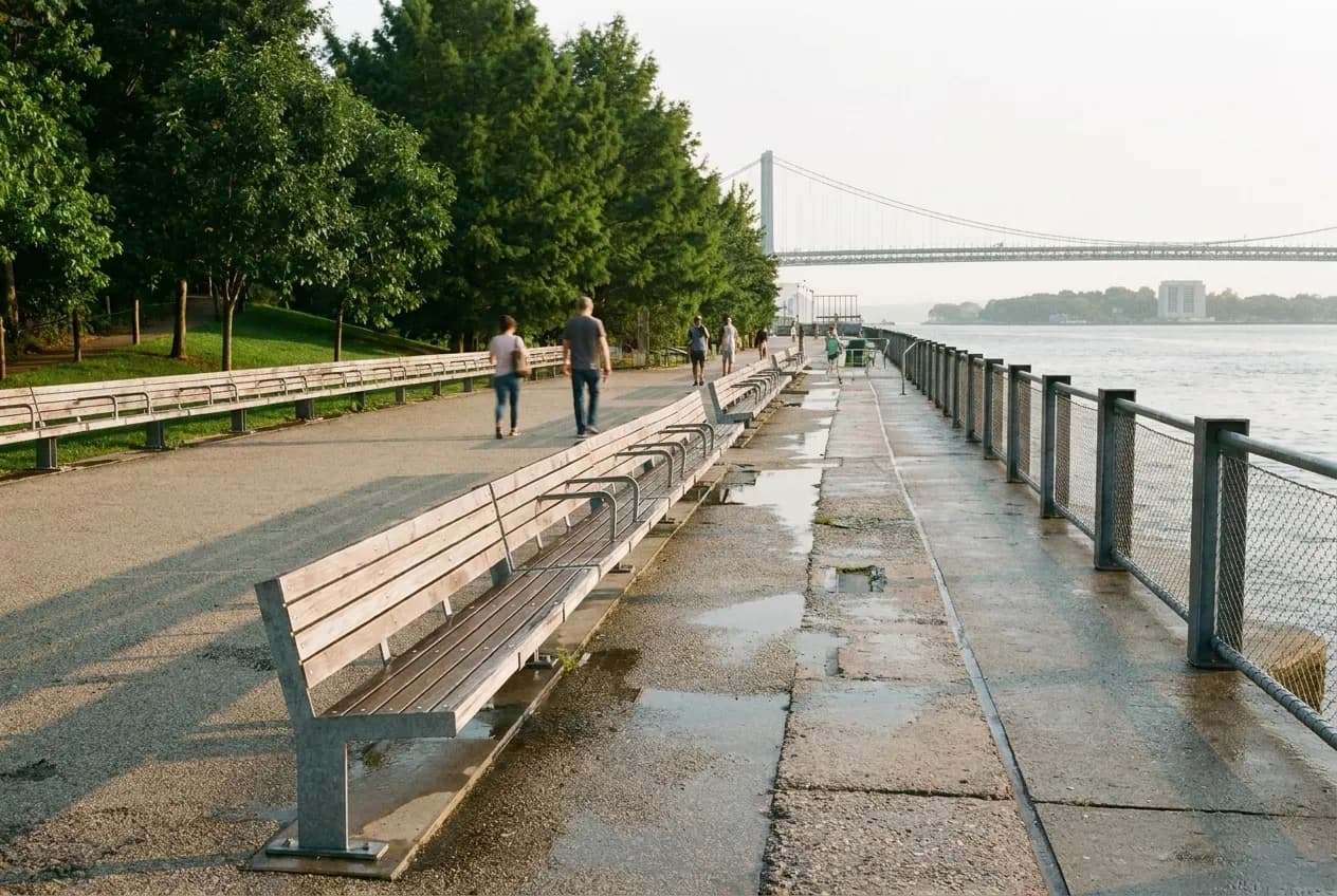 Waterfront park benches with bridge views in New York City