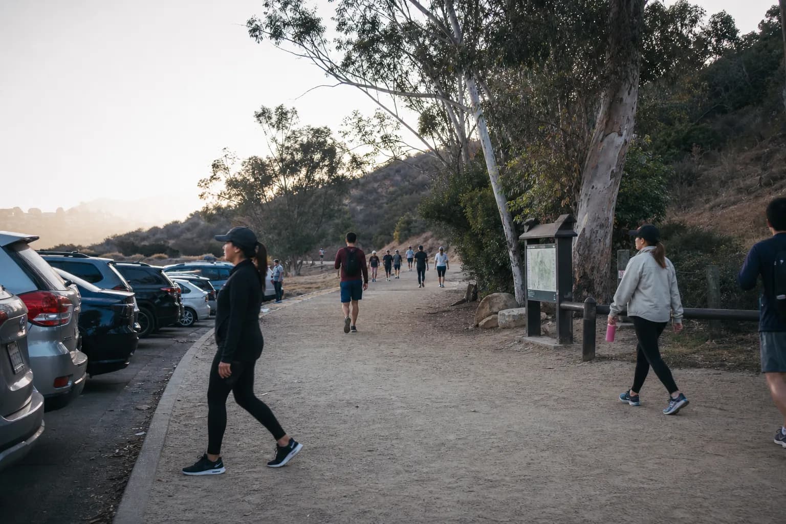 Parking area and trail entrance at the edge of Griffith Park in the morning.