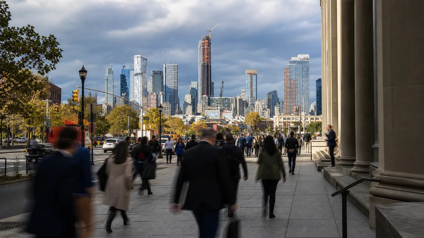 Lower Manhattan street scene near financial district buildings relevant to New York media and business readers.