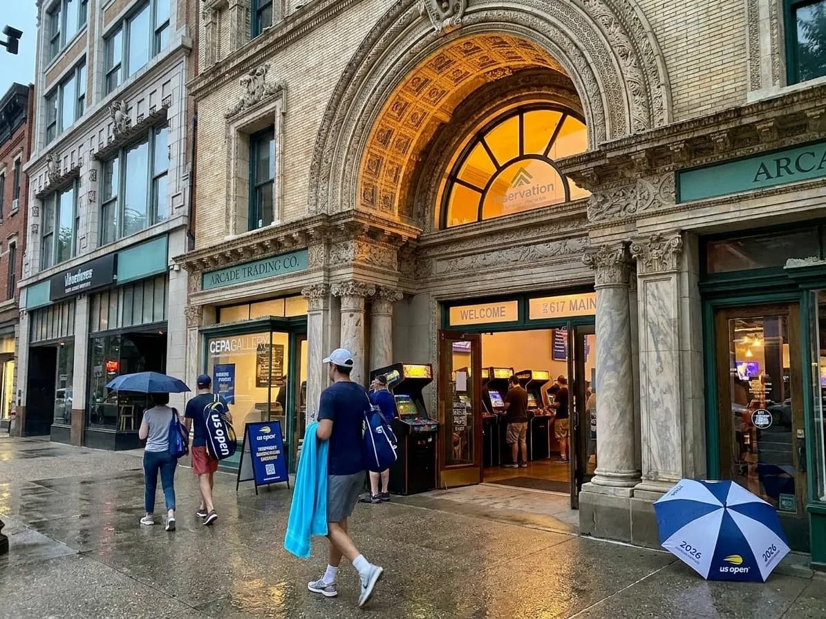A distinct New York editorial scene inspired by new york arcade interior, connected to US Open week.