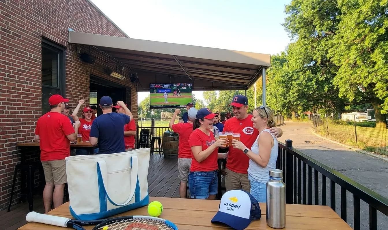 A bright Queens local-life scene connected to Guardians vs Reds Sports Screens Near Queens Tennis Hotels.