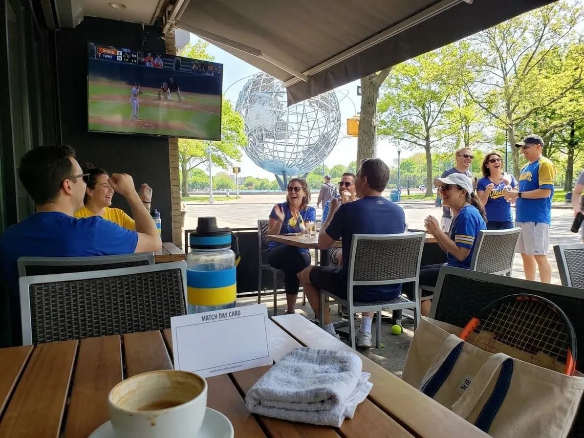 Bright Queens local-life detail for Orioles Twins Early Game Cafes During US Open 2026.