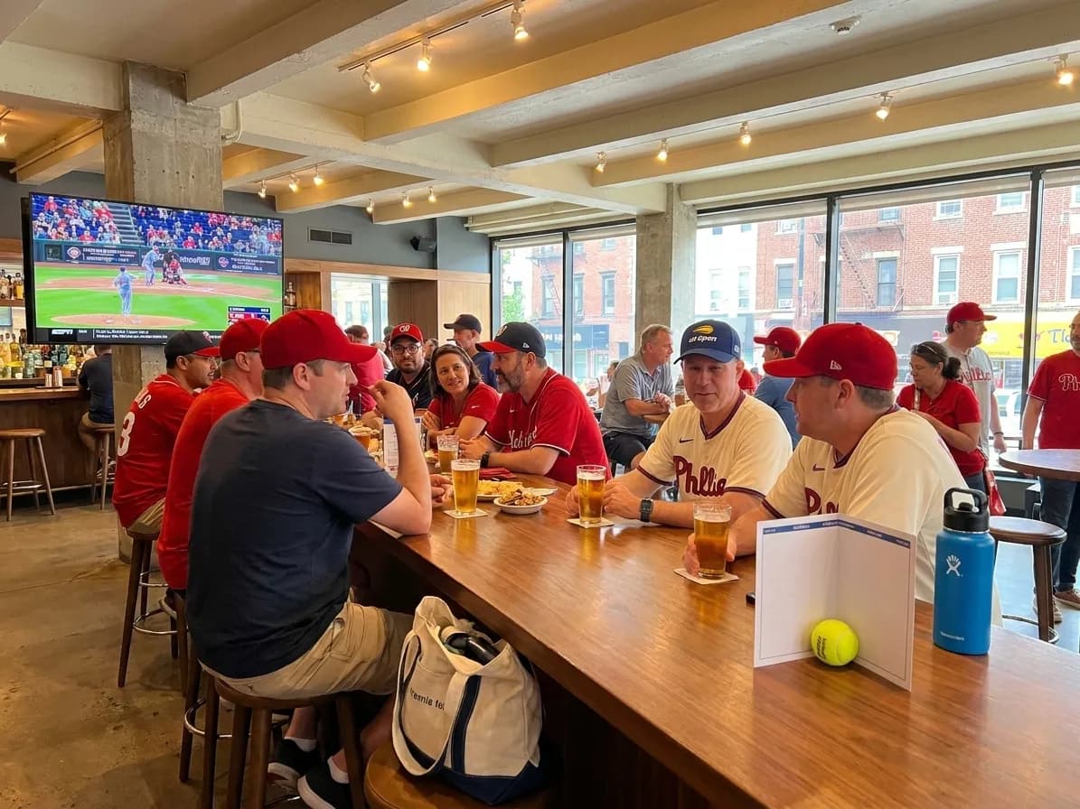 Bright New York local-life cover for Nationals vs Phillies Fans: NYC Hotel Sports Lounges US Open Week.