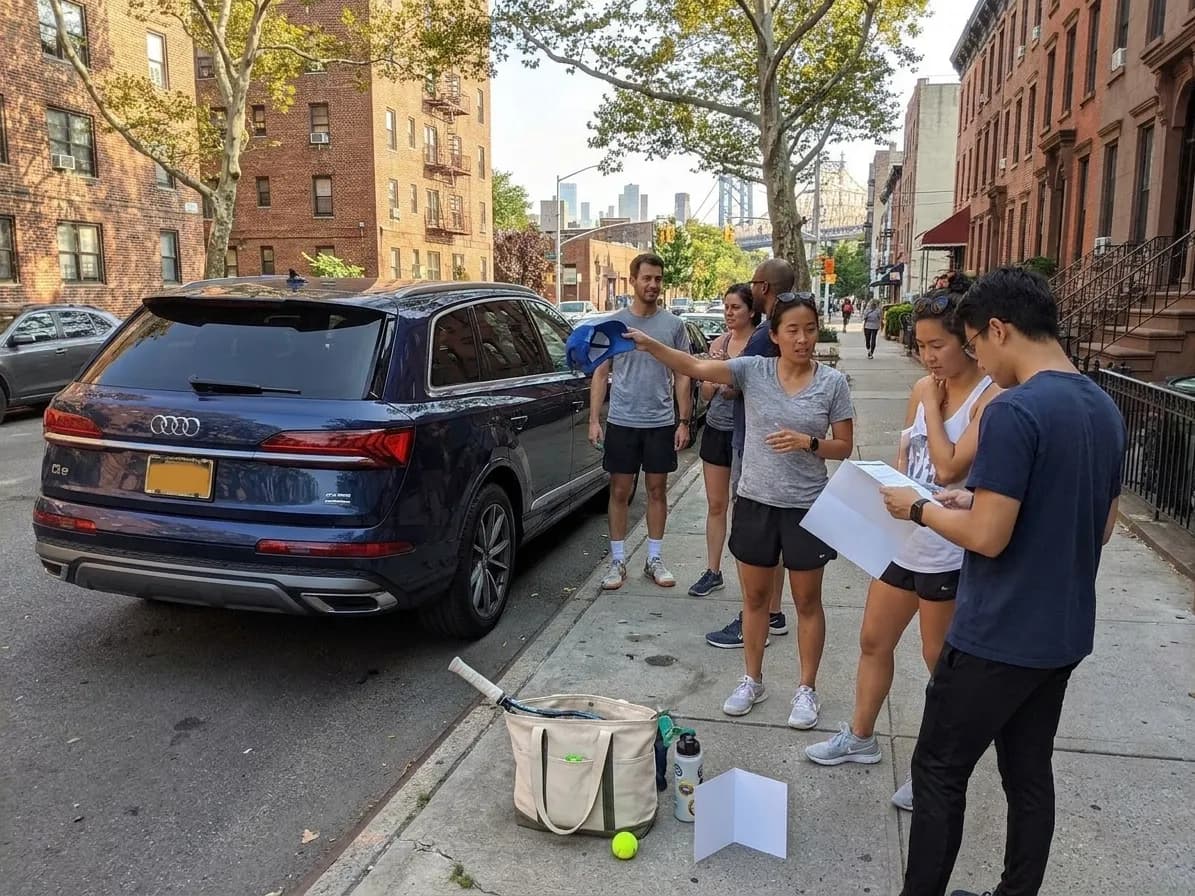 A bright Queens local-life scene connected to Audi Q9 Parking Questions Around US Open Car Days.
