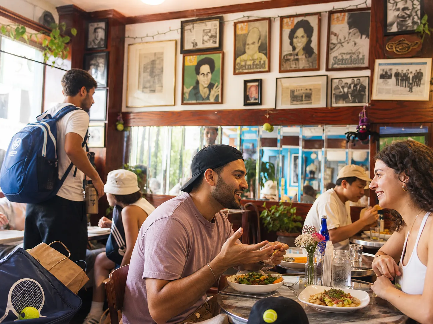 A bright Queens local-life scene connected to Aaron Donald Near US Open 2026: Vegetarian Food Halls Near The 7 Train.