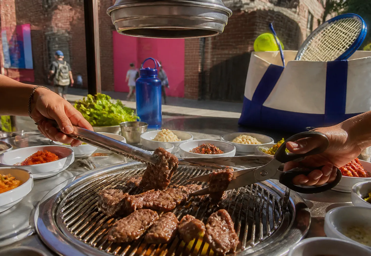 A bright Queens local-life scene connected to K League All Stars vs Man City Korean BBQ US Open.