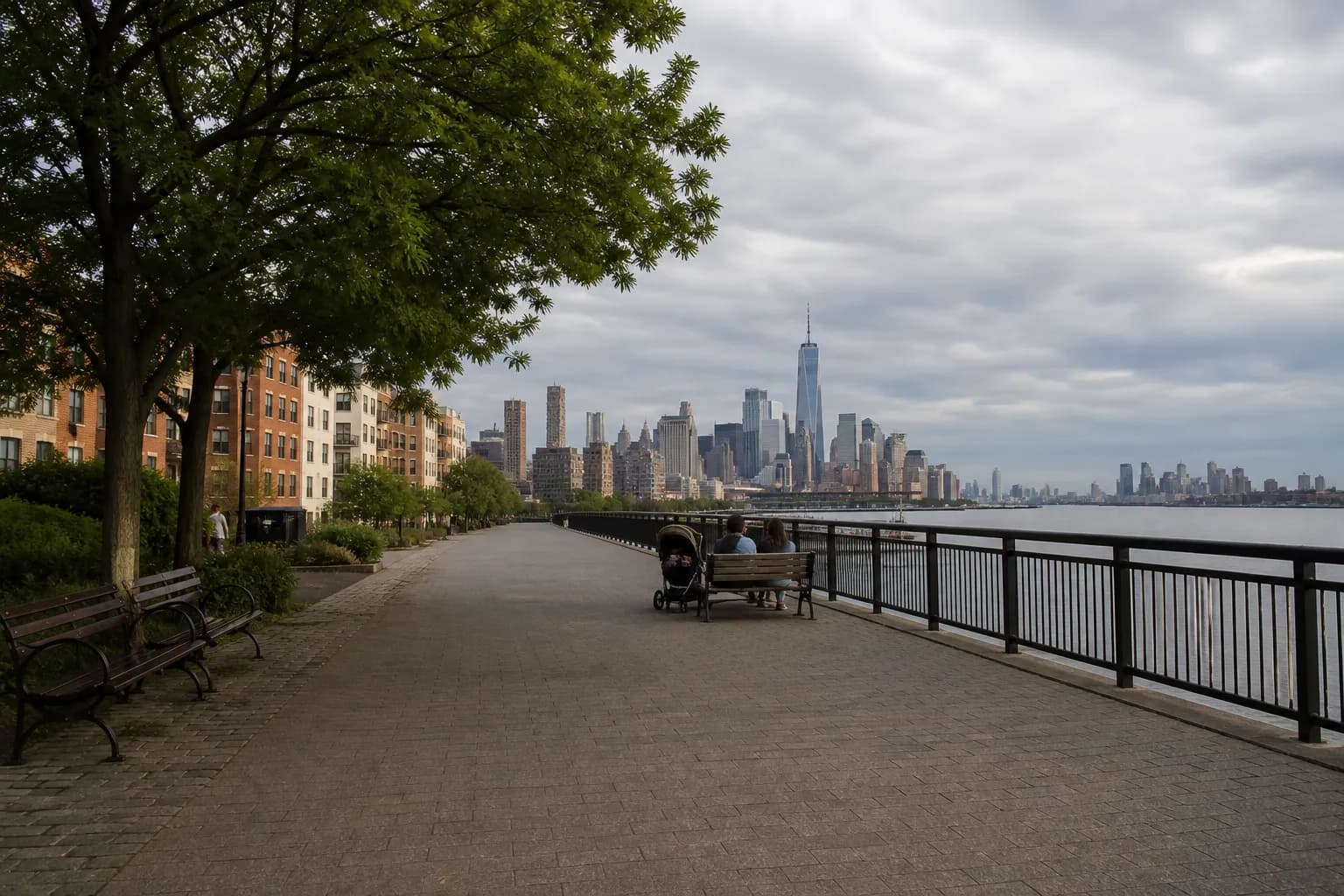 Families walking near the Hudson River park edge on the Upper West Side