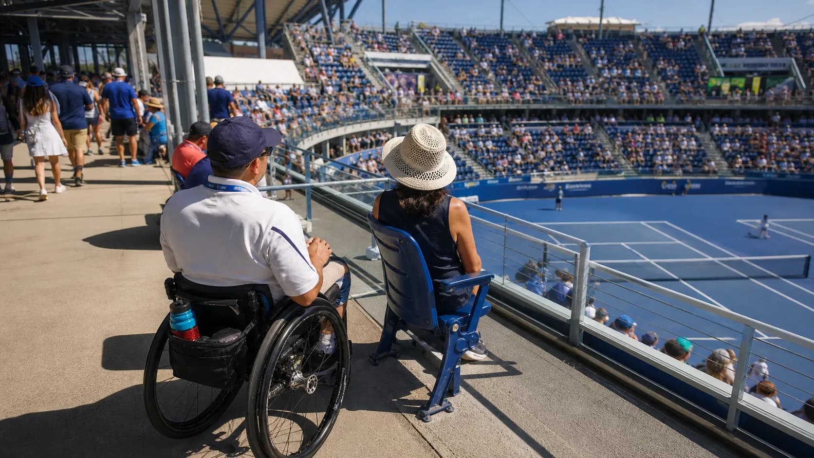 Photorealistic US Open tennis scene for US Open Accessibility Guide for Wheelchairs and Companion Seating.