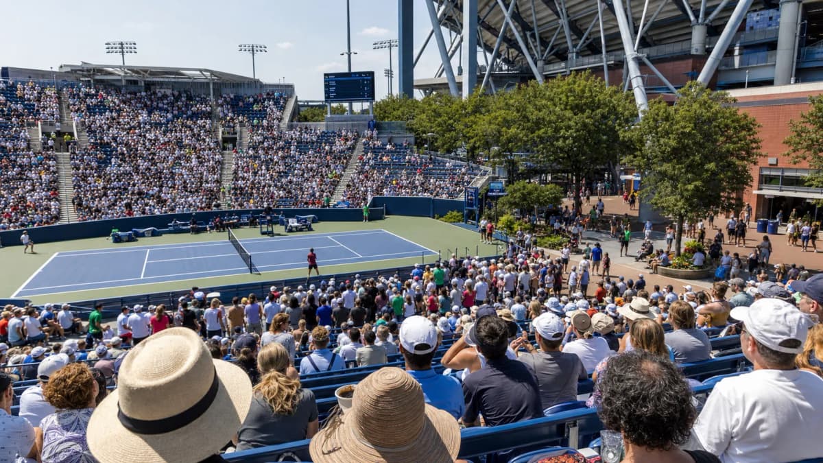 Bright US Open tennis atmosphere illustrating US Open Grounds Pass Explained: Value, Access, and Limits.