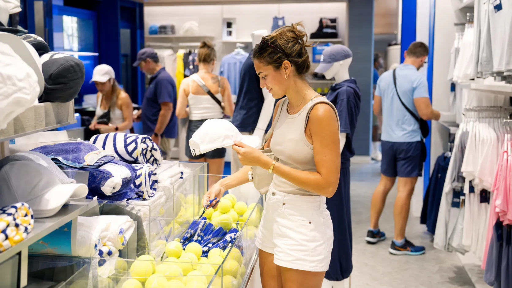 Photorealistic tennis scene illustrating US Open Souvenir Guide: What Is Actually Worth Buying.