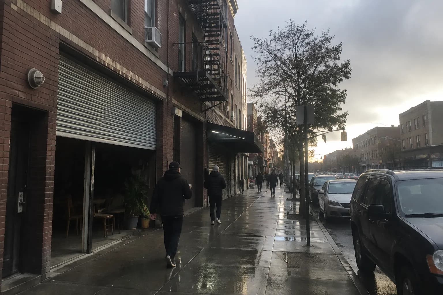 Flushing Avenue in Bushwick on a quiet weekend morning with storefronts opening