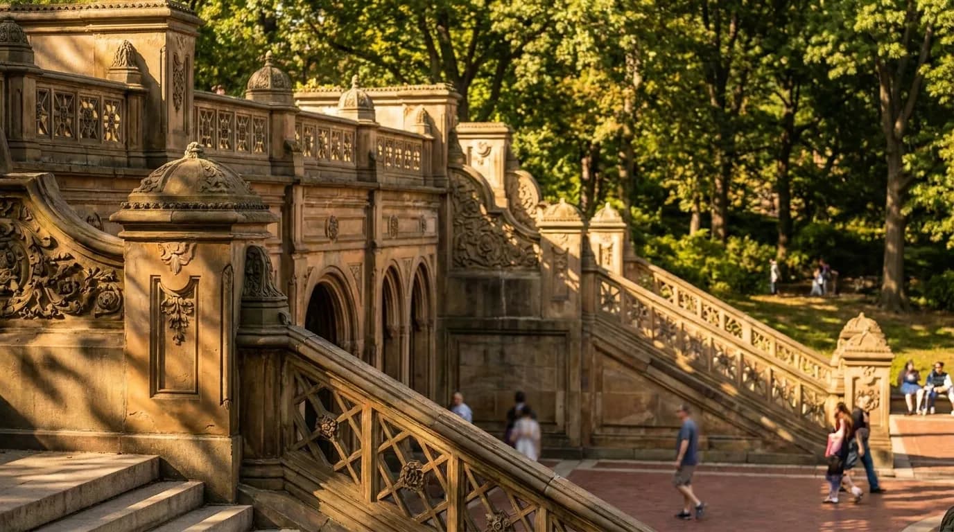 Visitors gathered around Bethesda Terrace fountain in Central Park on sunny afternoon
