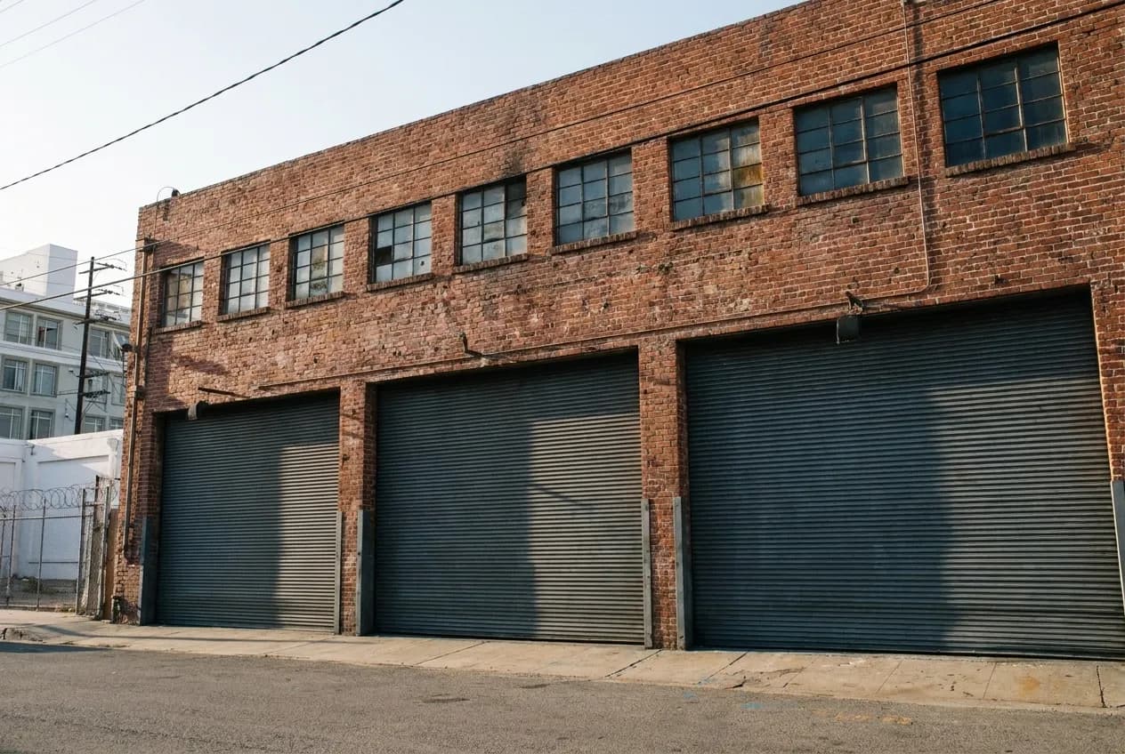 Industrial warehouse exterior in Los Angeles Arts District where urban wineries operate tasting rooms