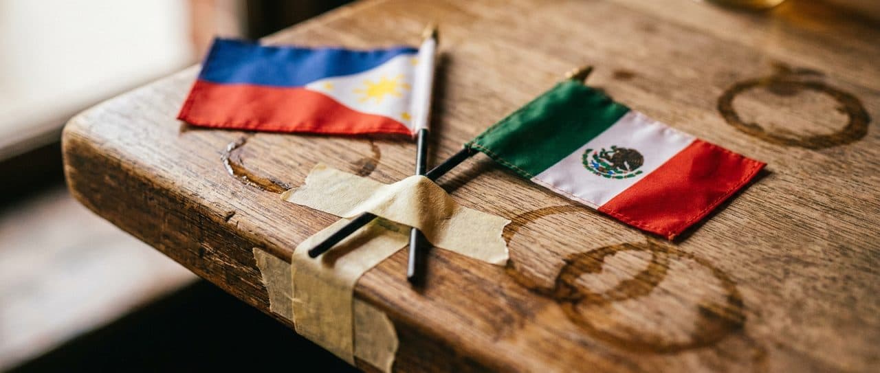 Woodside Bars During the FIFA World Cup 2026, Crossed Flags and a Shared Table scene