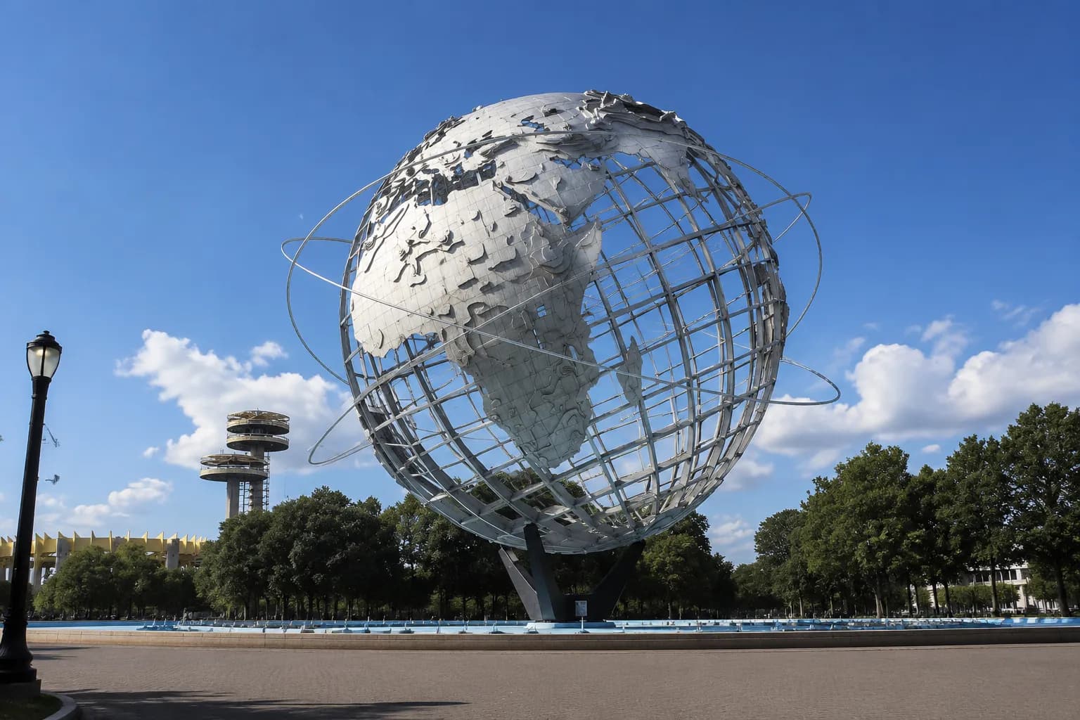 The Unisphere steel globe at Flushing Meadows Corona Park in Queens on a clear afternoon