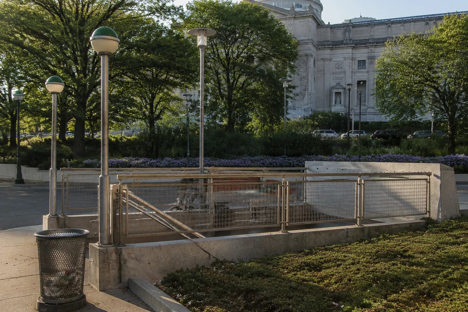Eastern Parkway subway station entrance with Brooklyn Museum steps in background under morning light